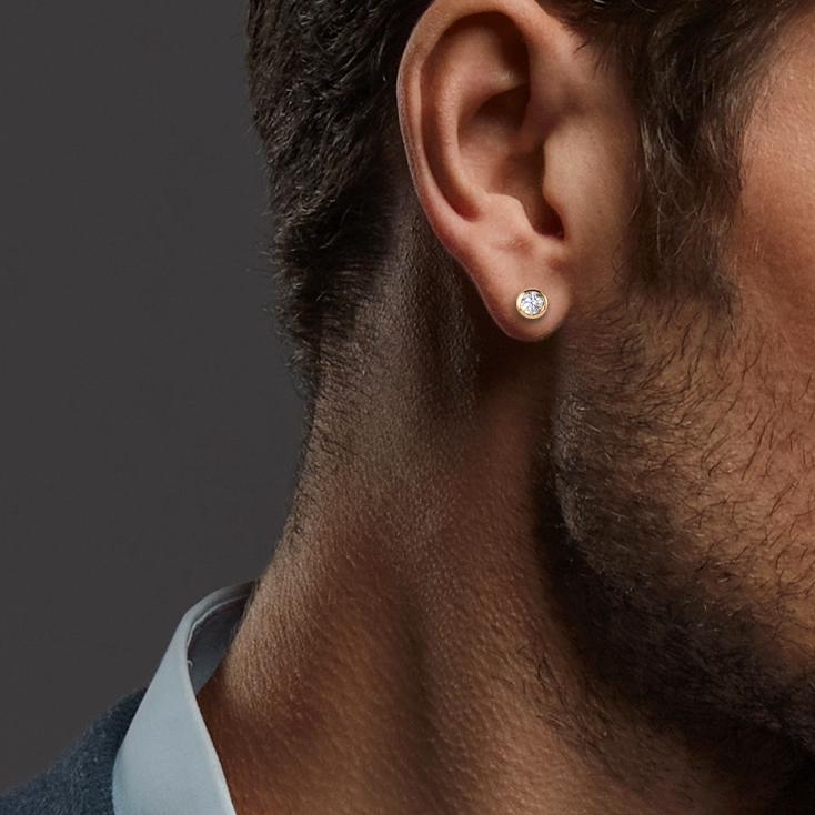 Ørestikker 750/18K guld Zirconia 2 Sten Ø3 mm
